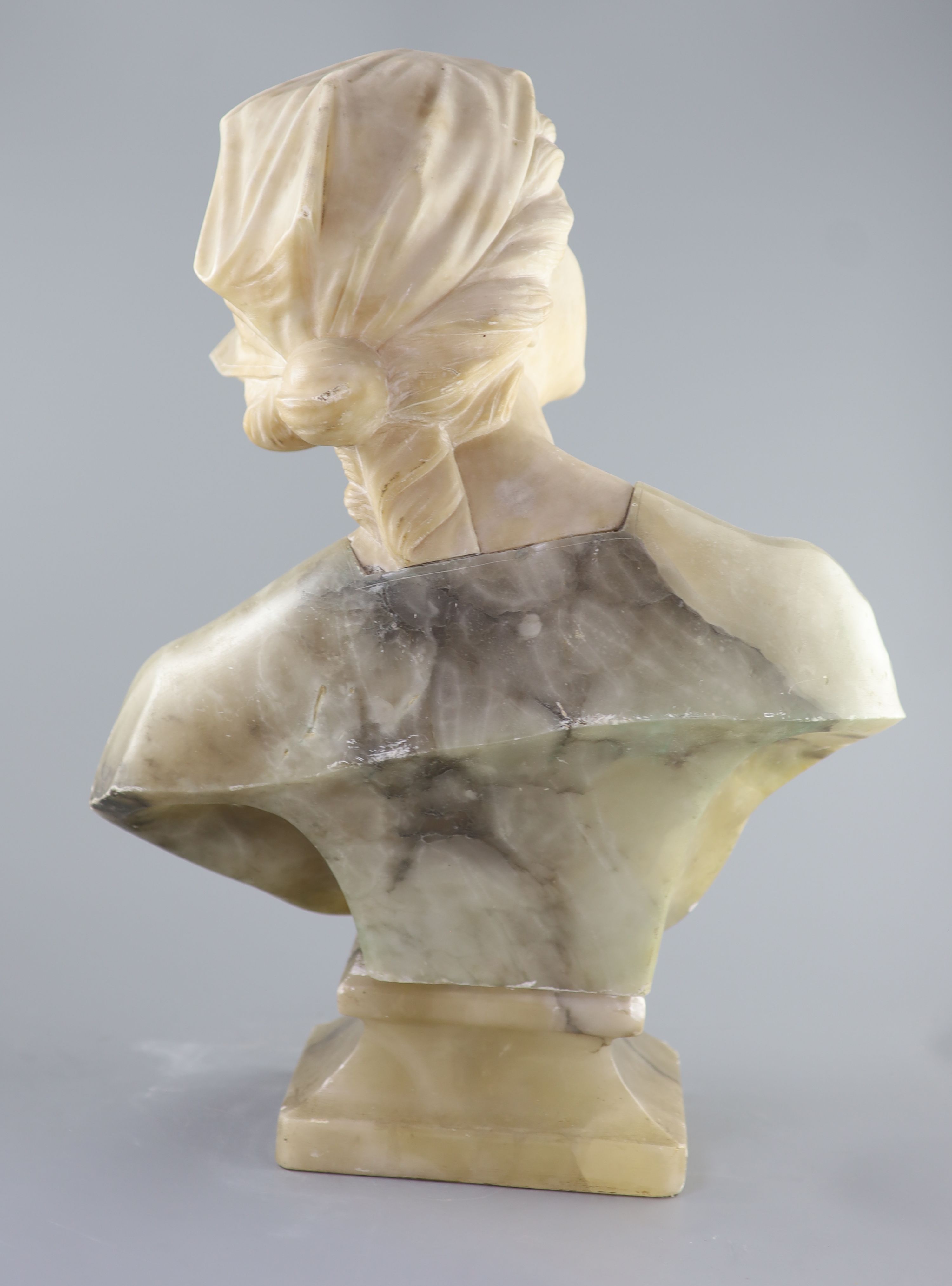 A carved Italian marble and alabaster study of a youth, 19th century (unsigned) 58cm high.